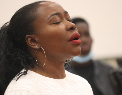 buki praying in church as she processes God's plan